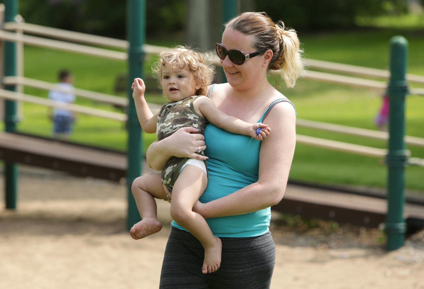 Tonya Deason plays with son in Copeland Park in La Crosse